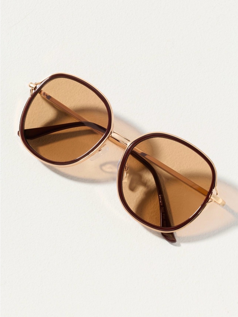 Women's Brown rimmed circle glasses from Anthropologie